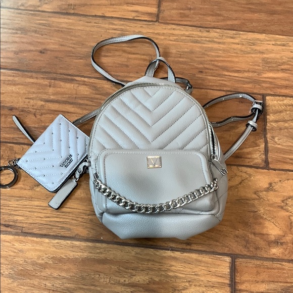 Victoria's Secret Handbags - Victoria's Secret Gray Quilted Backpack with Silver Accents